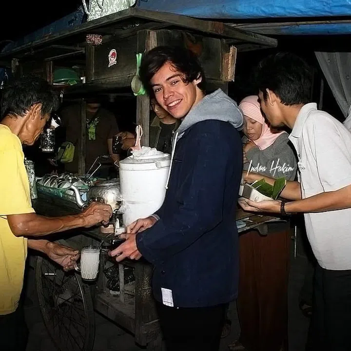 A young Harry Styles caught red handed being a Casanova, pre-One Direction. His secret weapon? A killer smile and ordering the perfect beverage, each time. 