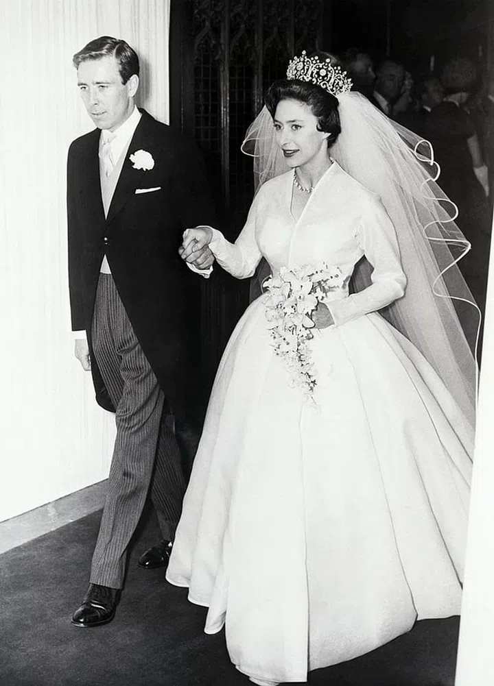  Margaret wore the Poltimore Tiara on her wedding day, which was purchased as Margaret's engagement to Antony Armstrong-Jones was announced. Garrard created the tiara in the 1870s for Lady Florence Poltimore. Sadly, the gorgeous piece was sold after Margaret's death at auction in 2006.