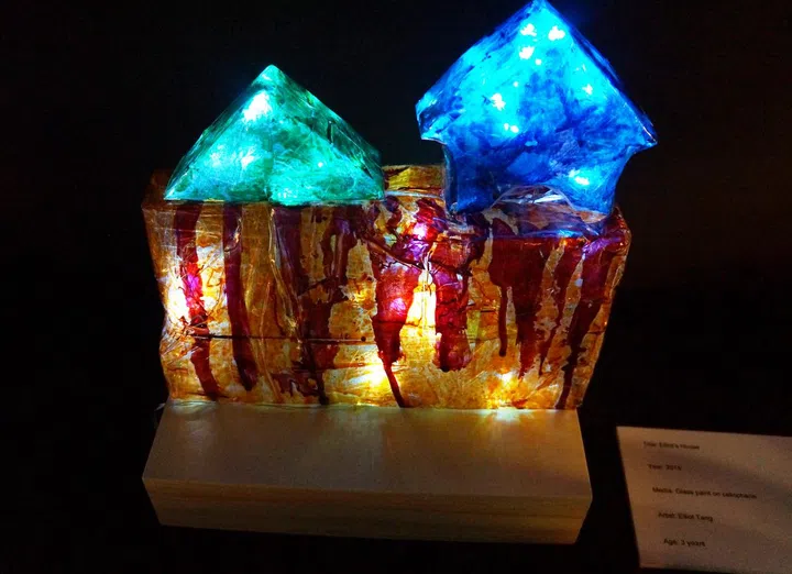 A lighted house created by 1 of Odyssey's preschoolers-an inspiring display of creativity and perspectives.
