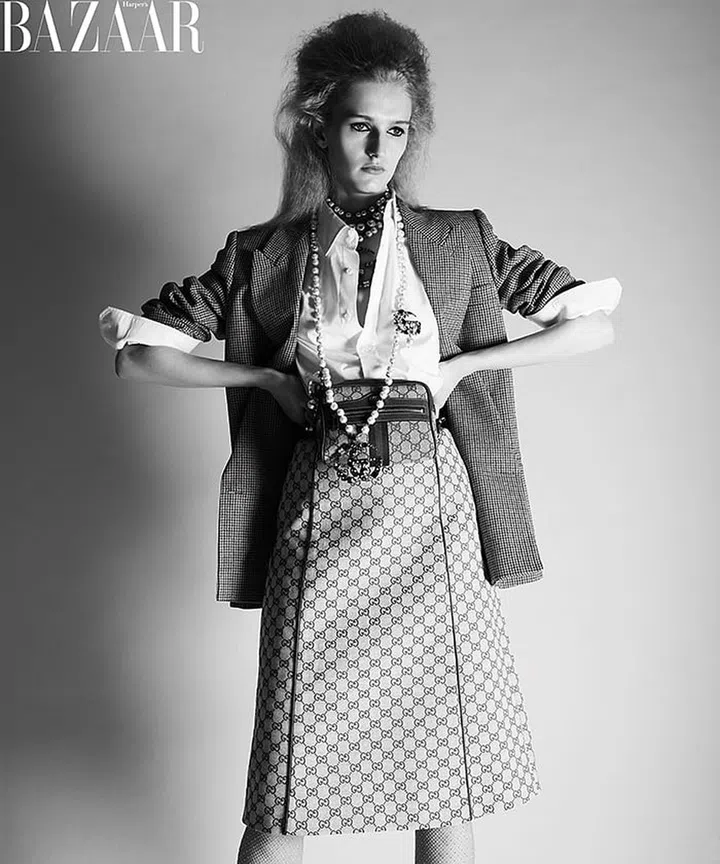 Gucci jacket, shirt, skirt, necklaces, bag (worn as belt), and tights
