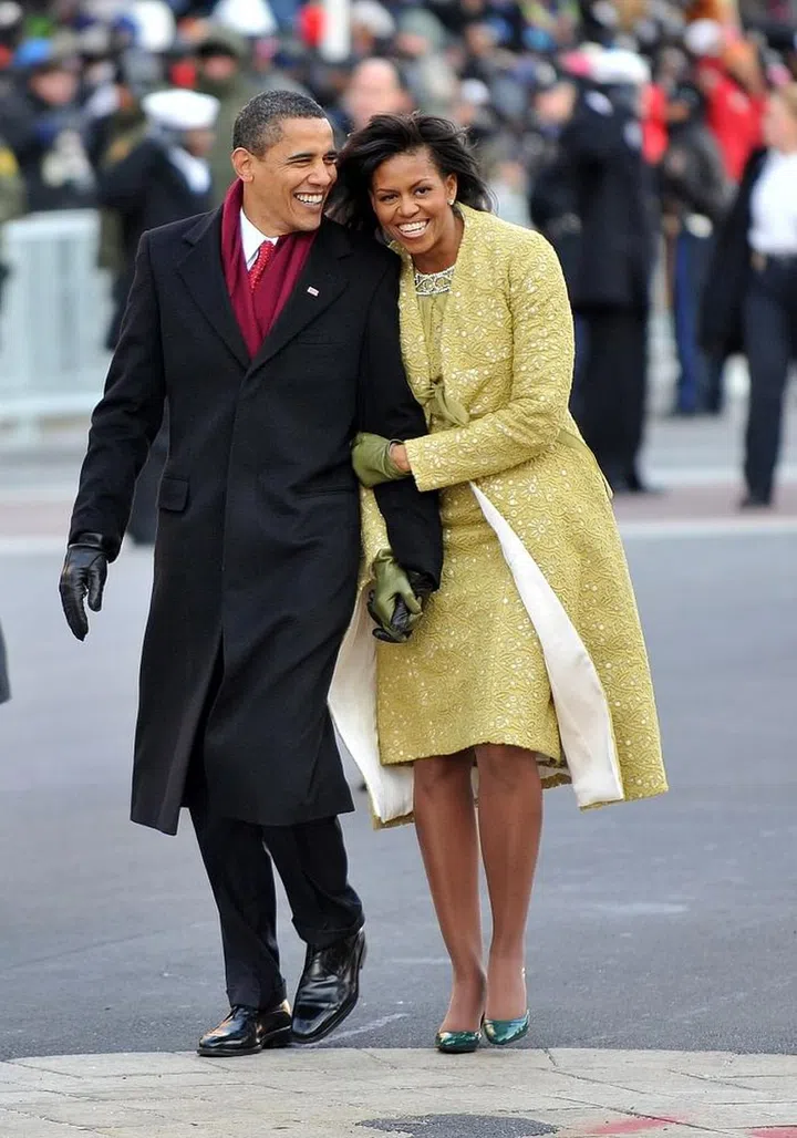 WASHINGTON - JANUARY 20:  President Barack Obama and first lady Michelle Obama walk in the Inaugural Parade on January 20, 2009 in Washington, DC. Obama was sworn in as the 44th President of the United States, becoming the first African-American to be elected President of the US.  (Photo by Ron Sachs-Pool/Getty Images)