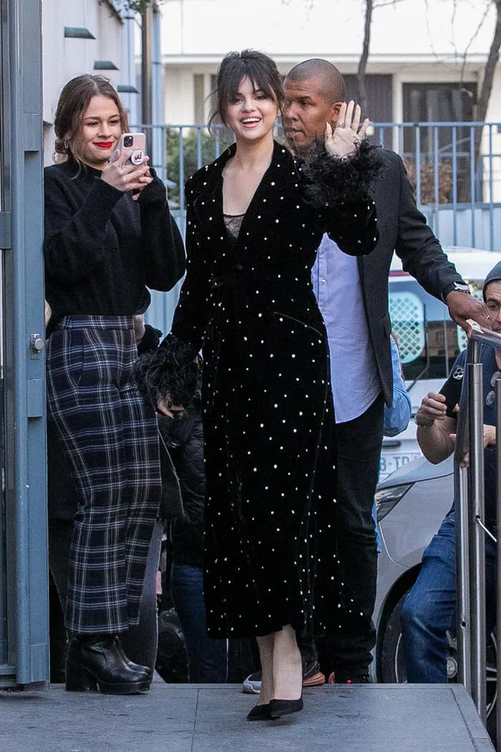 Selena Gomez spotted in Paris donning a Miu Miu embellished velvet coat, Paco Rabbane slip dress and black Prada D’Orsay pumps. She accessorises the look with jewelry from Messika Jewelry.

Photo: Marc Piasecki/Getty