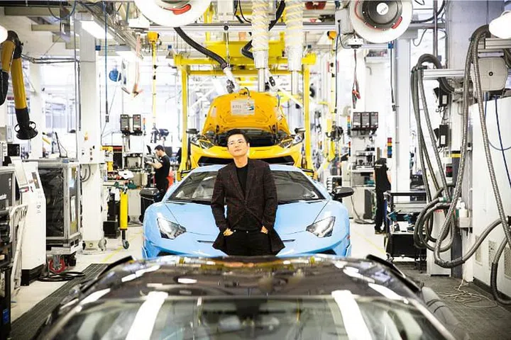 With the Aventador SVJ at the Lamborghini factory.