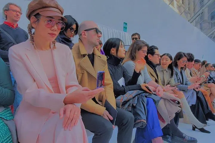 Local influencer Nellie Lim capturing Max Mara's runway moment with Samsung Galaxy Z Flip.