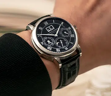 man wearing A Lange & Söhne minute repeater perpetual watch