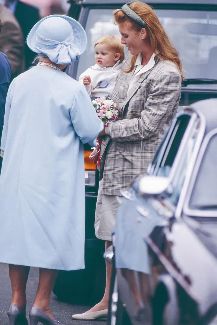 The Queen greets Sarah, Duchess of York and Princess Beatrice. Photo: Getty