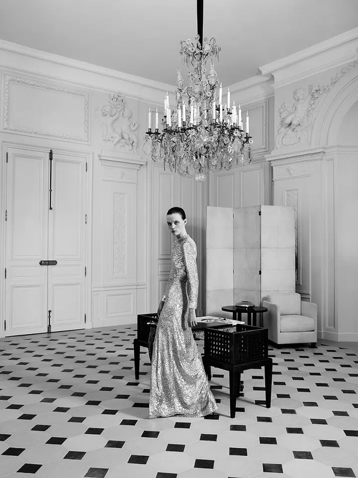 Saint Laurent girl Flo in a fully hand-embroidered couture platinum evening gown