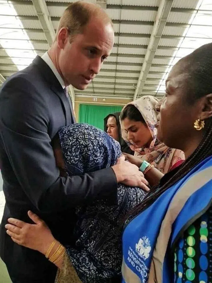 Prince William comforting victims of the Grenfell Tower victims.