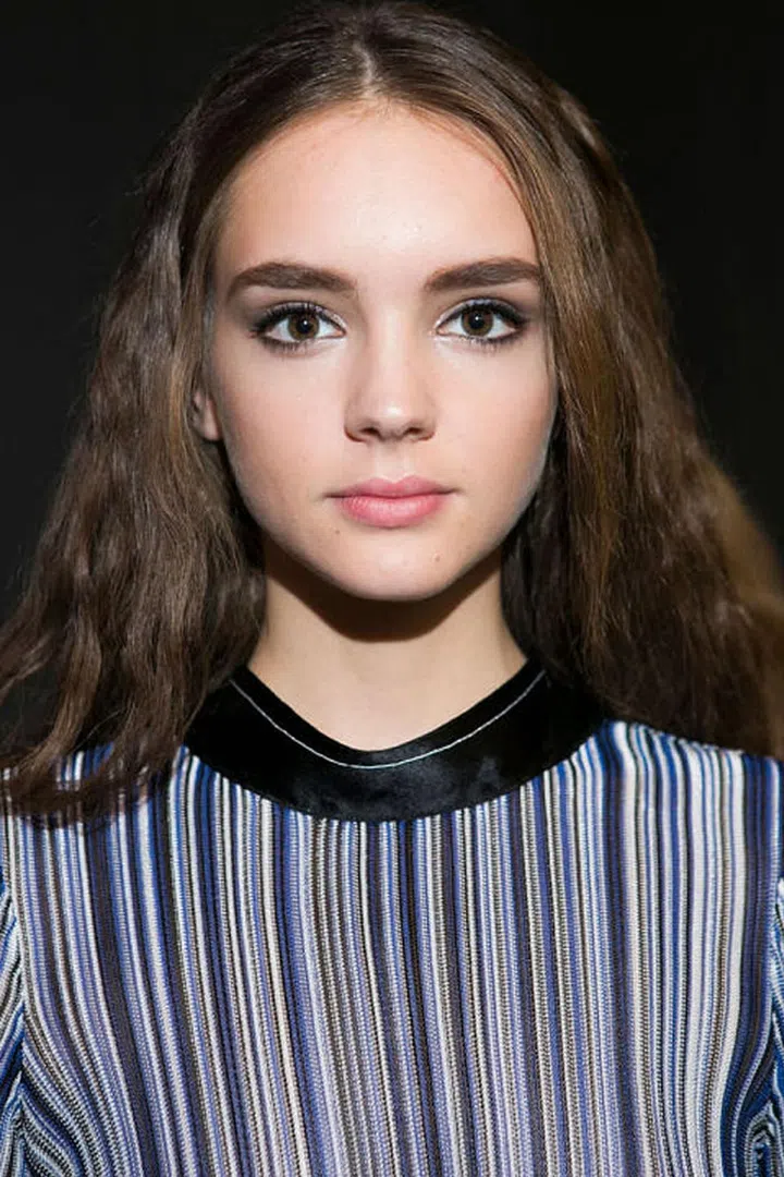 Backstage at Sonia Rykiel, makeup artist Lisa Eldridge used a navy eyeshadow shade from the Lancôme Saint-Germain palette (which was part of a capsule collection the beauty brand did with Rykiel) to create a smudgy eyeliner look. It was reminiscent of the eyes the late fashion designer preferred to wear.