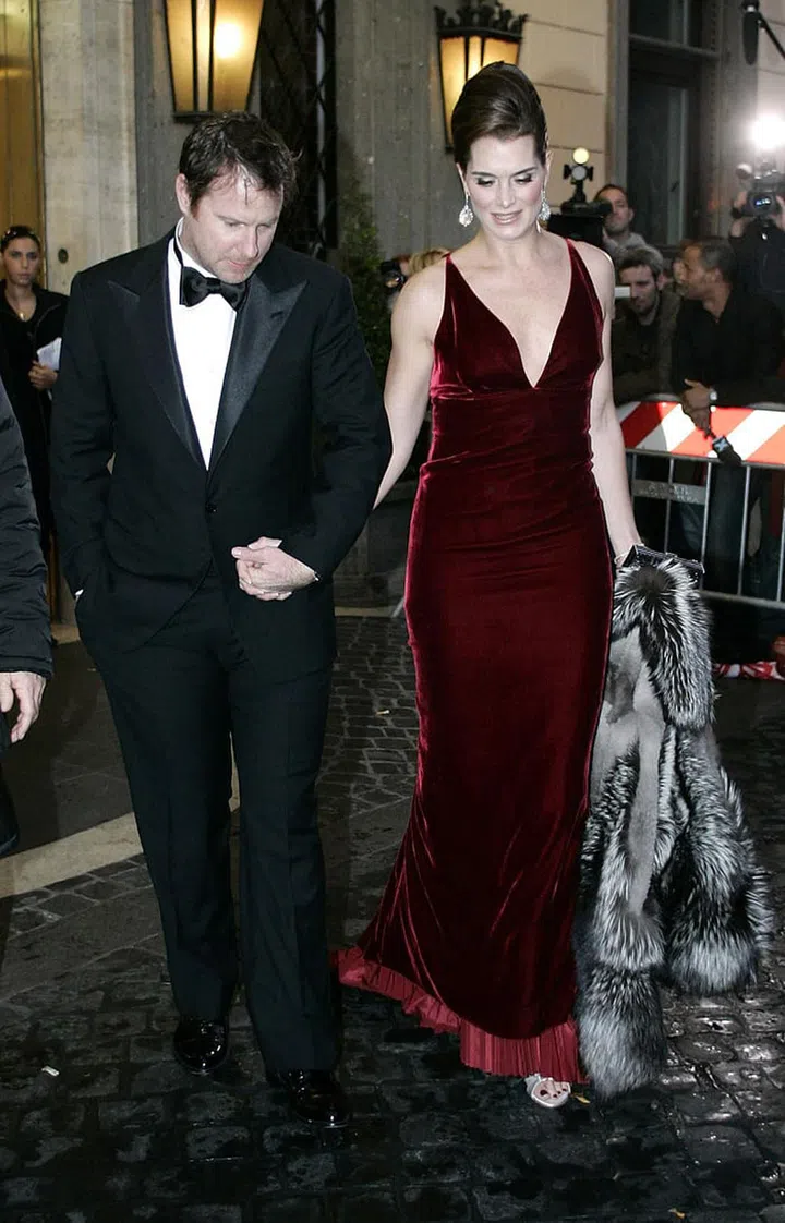 In crimson velvet at the wedding of Katie Holmes and Tom Cruise. Photo: Rex Features