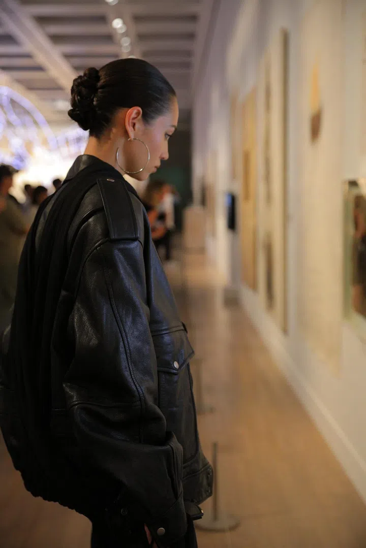 Kiko at the “Ramble In The Cosmos – From Primeval Fireball Onward” exhibition. Image: Saint Laurent.