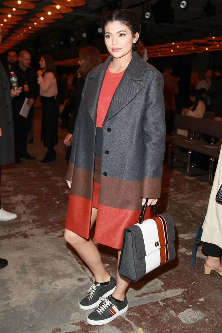 Love her or hate her, you can't deny that this young media mogul just has a way of making clothes that fall on her back look so, so cool. (Photo: Getty)