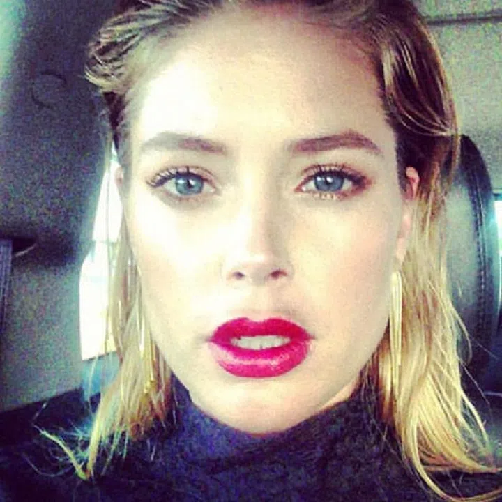 Find natural lighting like Doutzen Kroes or shoot in a well-lit room, you want the light in front of your face, not behind you.