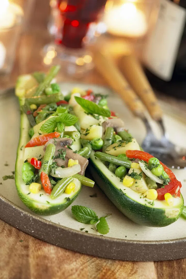 Zucchini has its own merits — i.e., it's low in calories — but its best trick is standing in for higher-calorie pasta. (Just spiralize and sauté, or swap for noodles in a pasta recipe.) You can also core and stuff squash with other vegetables and whole grains to round out a meal.