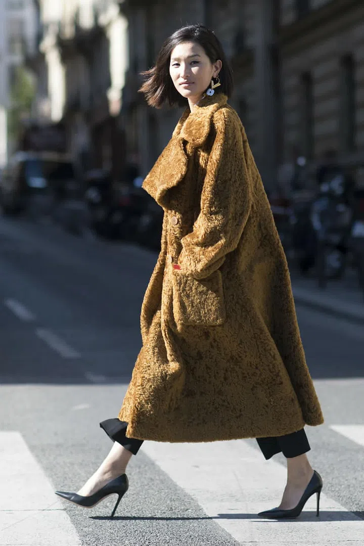 This elegant influencer is a fashion show front row regular. Looking at how sharp she looks all the time with nary a strand of hair out of place, why wouldn't she be? (Photo: Getty)