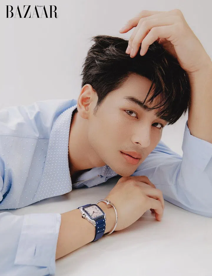Shirt, Prada. Bangle; watch, Cartier.