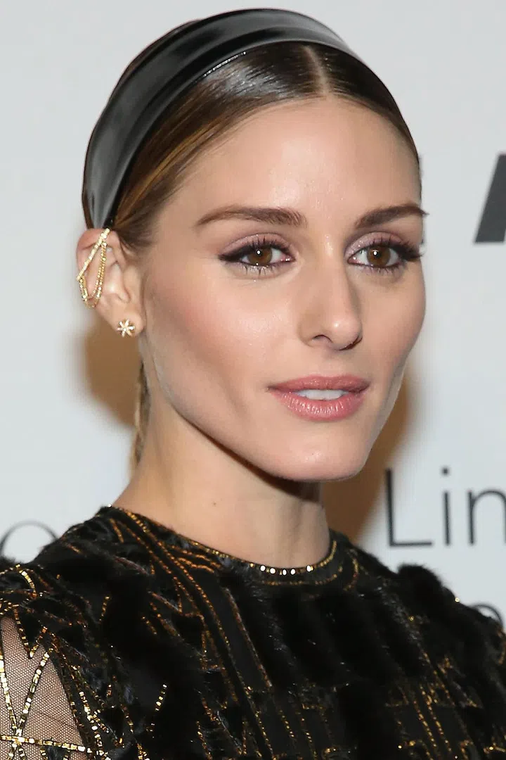Shellac your bangs down with pomade, then add a cool leather headband on top for double insurance.
