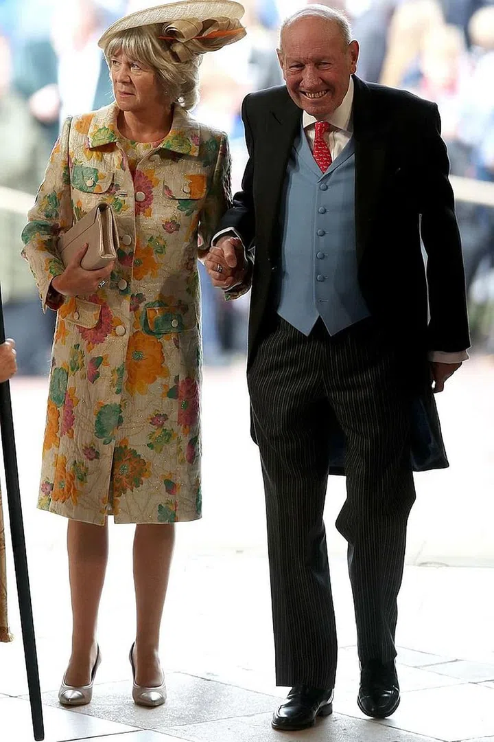 The groom's parents, Nicola and George Brooksbank, arriving to their son's ceremony.