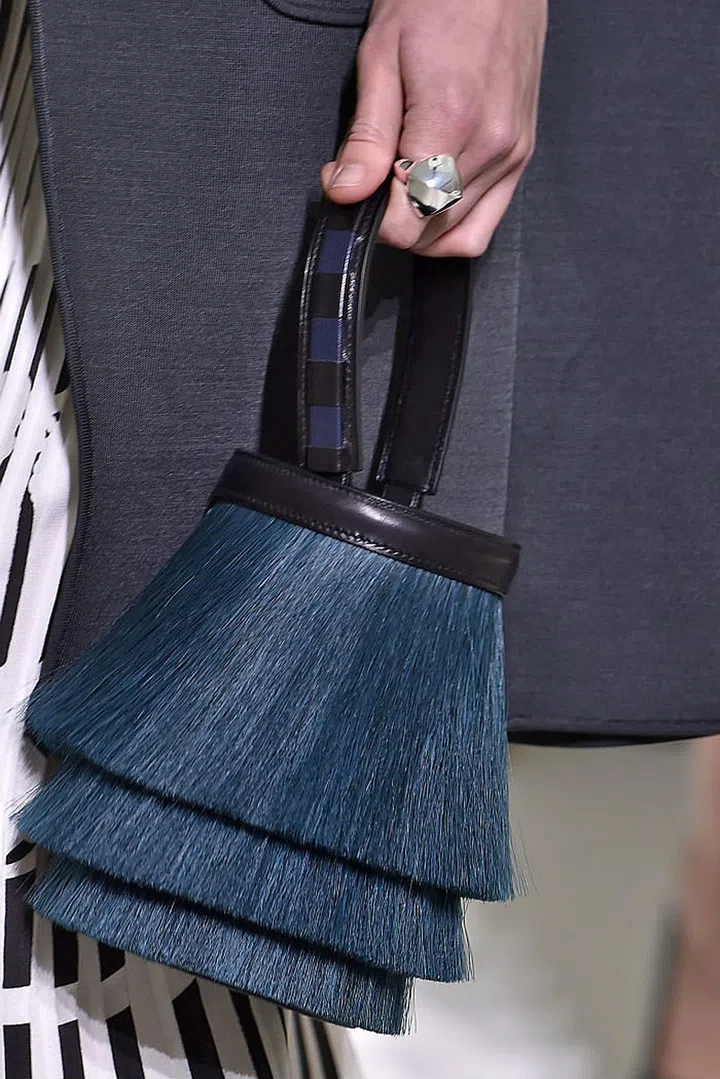 Seen at: Paris Fashion Week//Why we love it:  Shimmy shimmy! The movement of the feather-light threads gets our hearts still in admiration