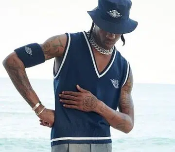 Travis Scott wearing Air Dior