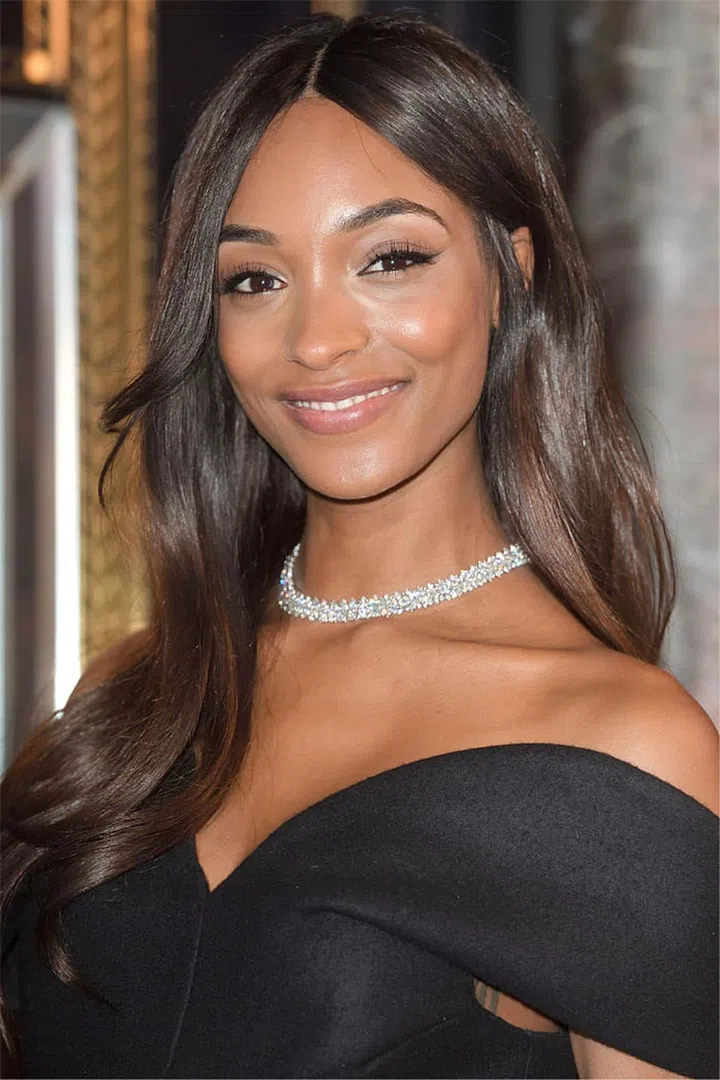 Jourdan Dunn goes glam with tumbling polished waves.