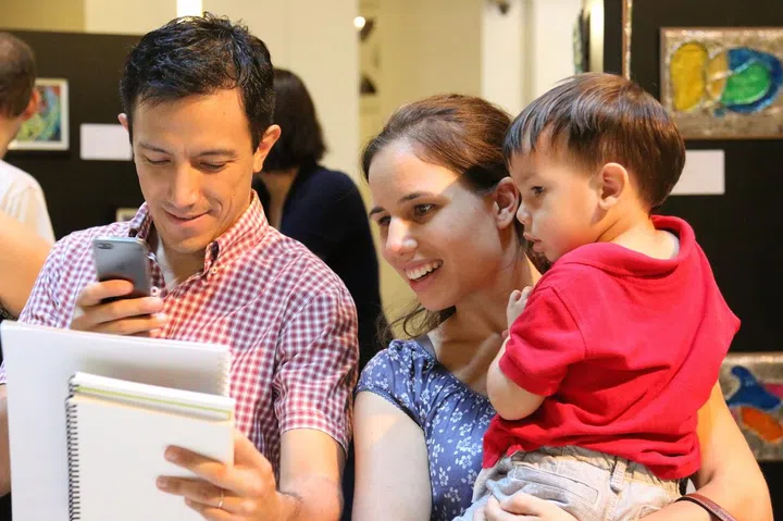 During the exhibition, parents captured their children’s proud moments on display. 