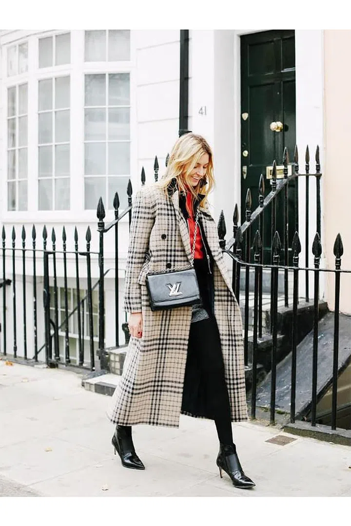 Ever heard of high-low? The bit people don't discuss as often is that the designer trophy pieces lend some of their shine to the low, which gives off the impression that the whole package is high—it's not just a marketing gimmick to get shoppers to think outside the box/tax bracket. Even if you've only got Vuitton and Vetements impostors, those will perform the same function of elevating less-"inspired" high-street togs. Photo: Instagram/camillecharriere