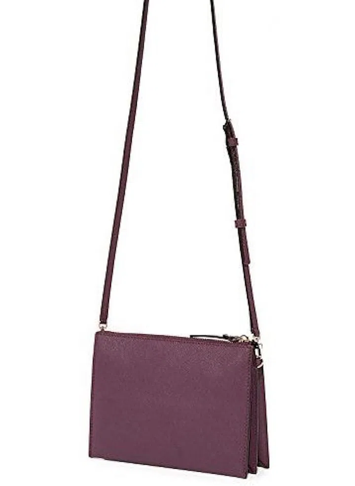 Oversized totes are nice, but when you're on the go, use to keep your hands free and your essentials safe.
