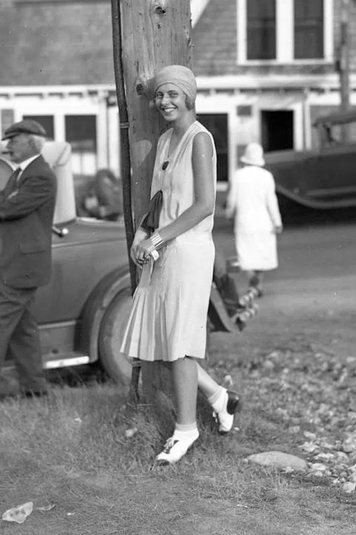 A flapper-favored drop-waist silhouette helps elongate any figure and still feels fresh for now. Bonus points when styled with a chic cap.
