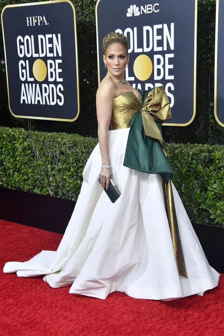Speaking about J. Lo, the star has gotten lots of flak for coming in a Valentino gown which looks like she's a present waiting to be unwrapped. Whether you like it or not, she has certainly caught everyone's attention. Photo: Getty