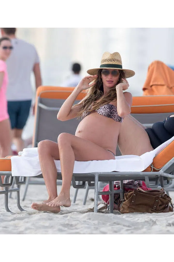 In early November 2012, Gisele took her bump to Miami Beach. A month later, daughter Vivian Lake was born. Photo: Splash