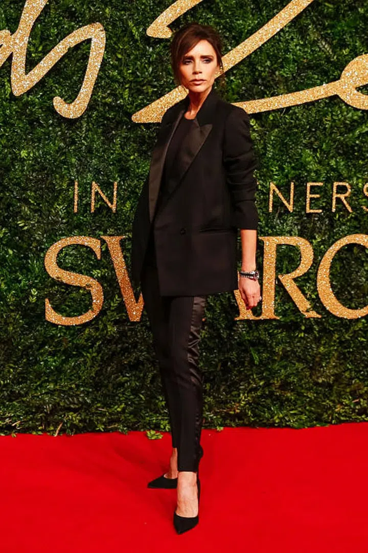 Beckham will no doubt include a few evening options in her new Target collection, and - judging by her recent predisposition to suits - we predict a classic black two-piece will ensue. Wear yours with white trainers by day or with court shoes by night.