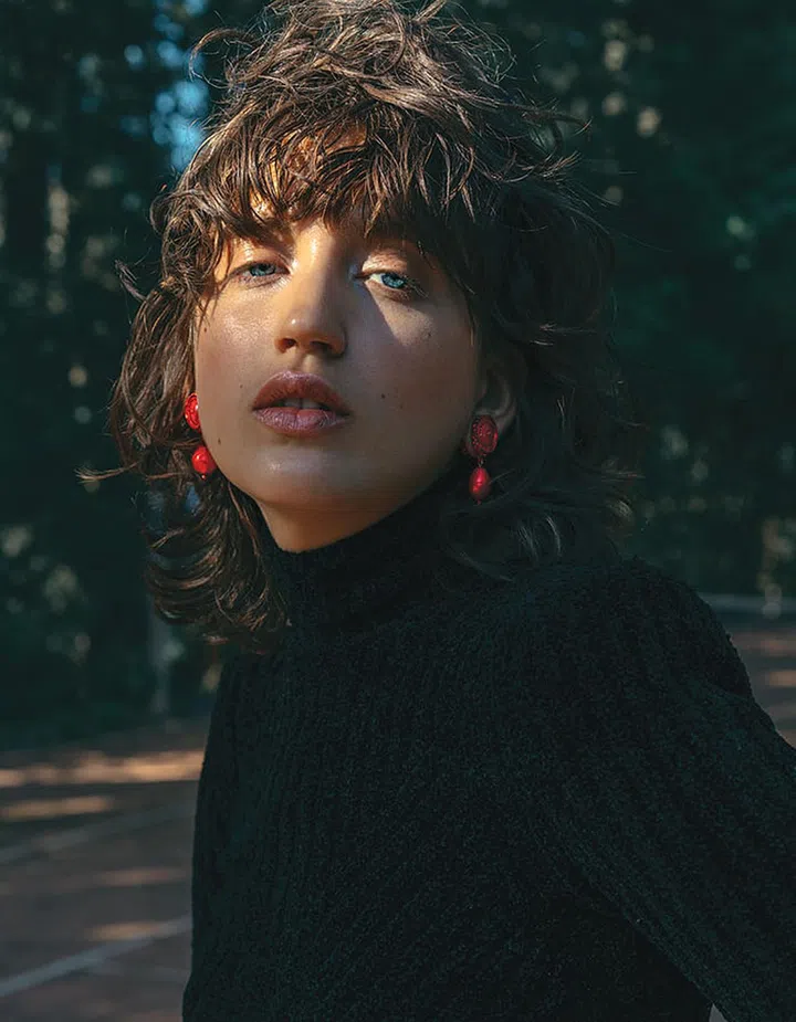 Stretch velvet top, Bottega Veneta. Metal earrings, Givenchy