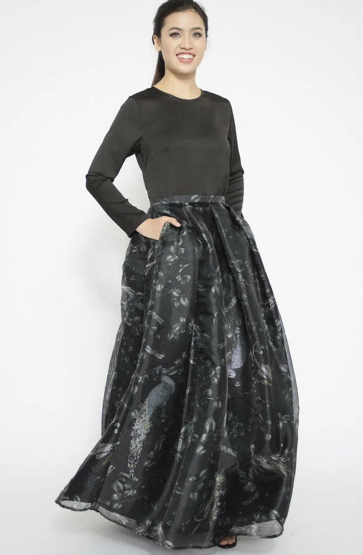 Bringing a feminine flair to any outfit is this beautiful printed maxi skirt that can be worked in many ways. Photo: Adlina Anis