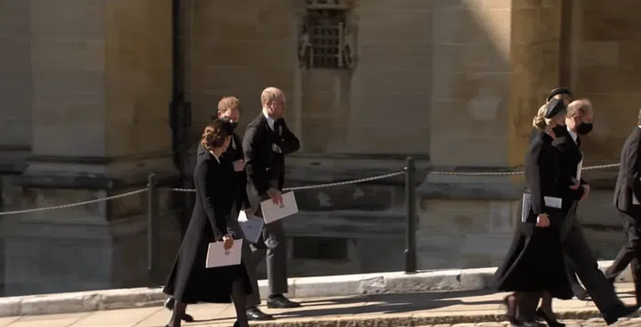 Kate Middleton, Prince Harry, and Prince William exiting St. George’s Chapel. (Photo: BBC YouTube)
