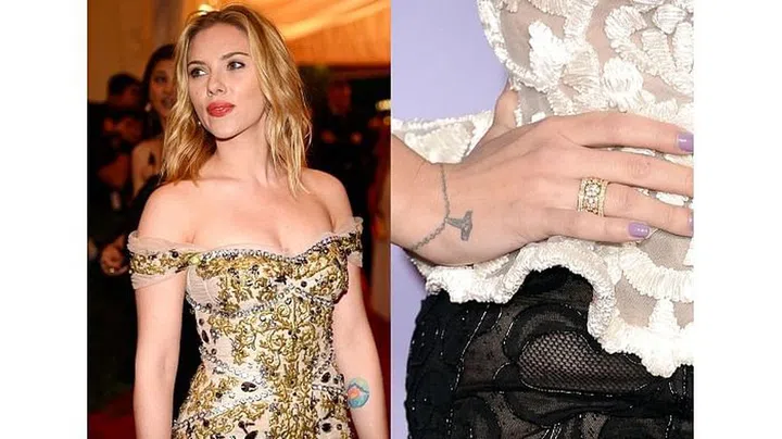 The actress sports a colorful sunrise on the inside of her left arm, a bracelet tattoo with a charm dangling off that reads "I [heart] New York" and a horseshoe with the words "Lucky You" on her ribcage.