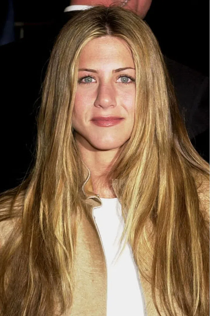 Where: The premiere of Erin Brockovich, 2000
The style: When Jennifer Aniston discovered hair extensions, she fully embraced the length they can offer.Photo: Getty