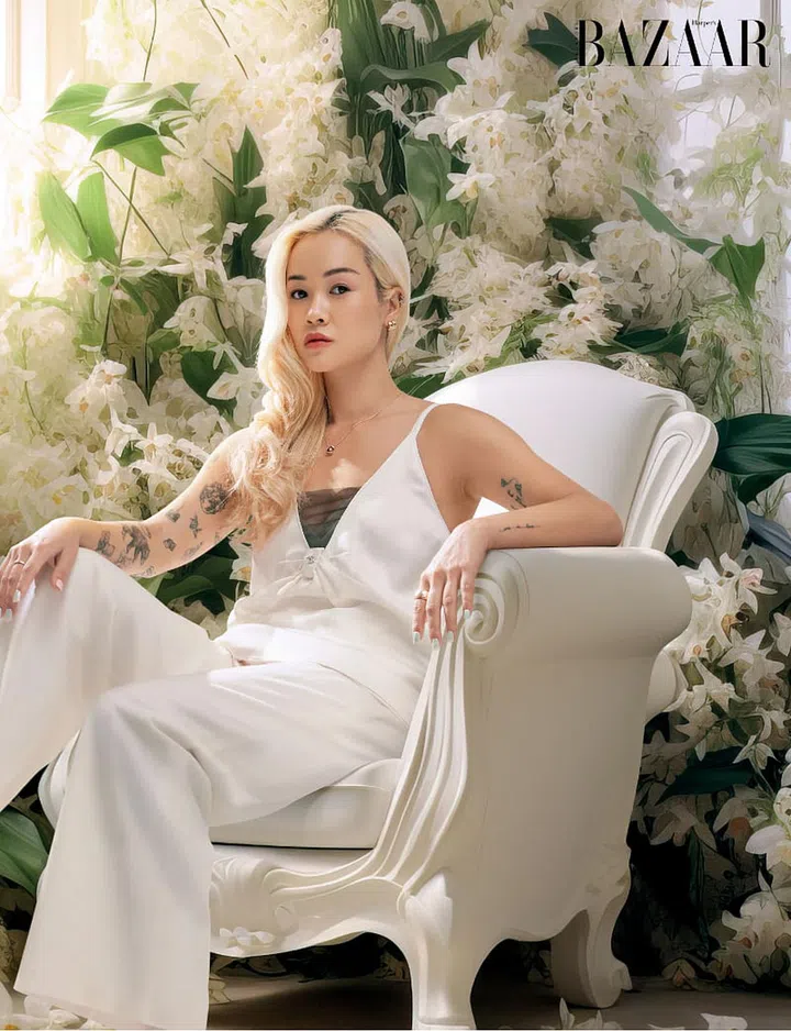 Top, Chanel. Trousers, stylist’s own. Necklace; ring, Chanel
