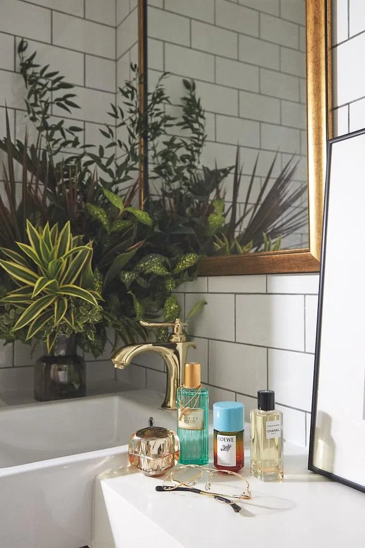 On Cao’s beauty counter: Clé de Peau Beauté’s
La Crème, a few scents and a pair of Louis Vuitton glasses.