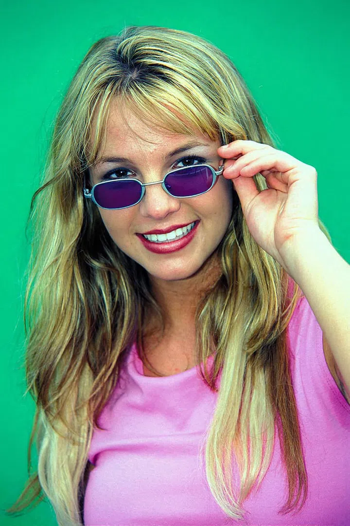 Sunglasses of the '90s—namely those ultra-tiny Matrix-inspired specs—have been enjoying a revival for quite some time now. But the colorful lenses spotted on virtually every celebrity in the '90s are taking over for spring and summer (side-note, can we appreciate Britney working this pair for a second?).
