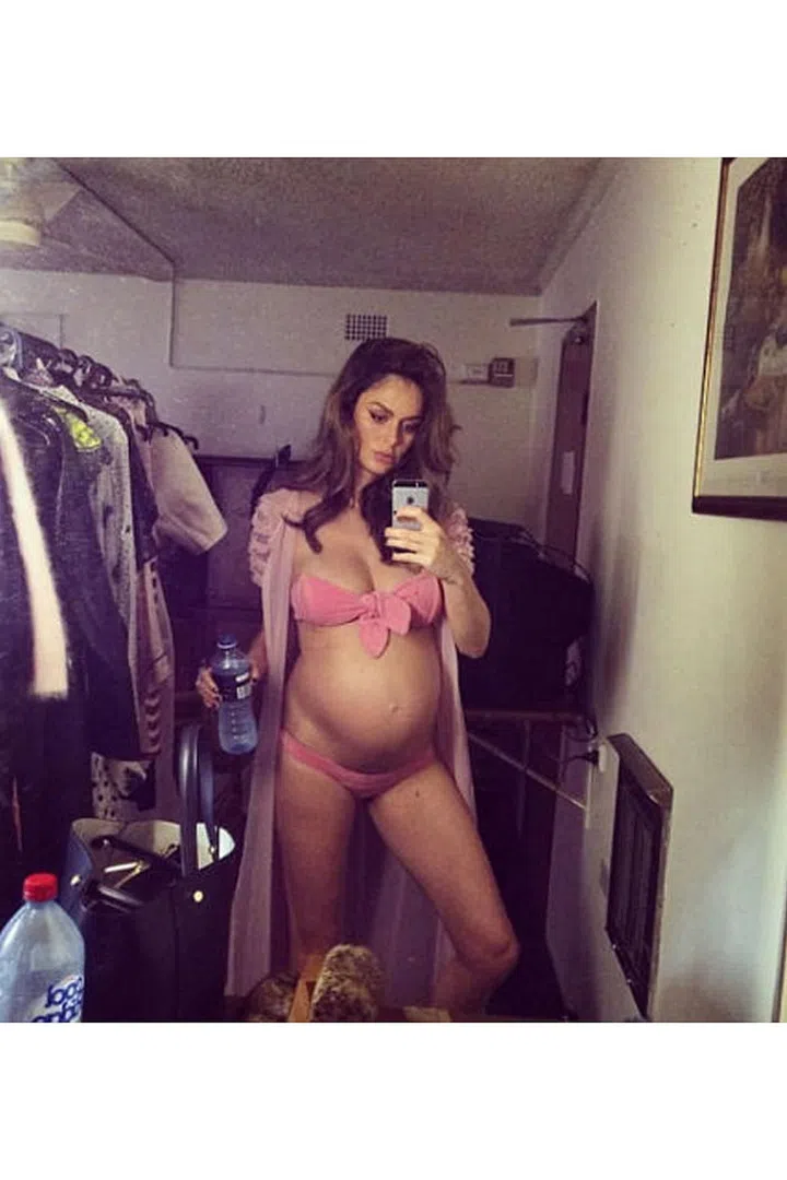In October 2014, the model was all business as she worked while seven months pregnant. Photo: Nicole Trunfio