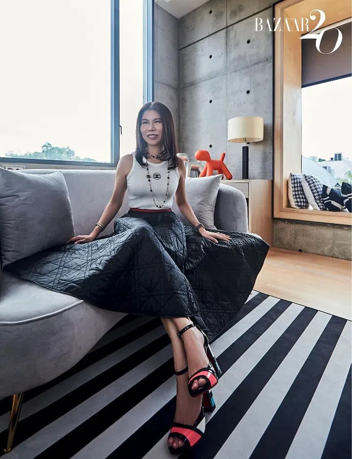 Chuah, in her Chanel top, Dior skirt and Christian Louboutin heels, in the lounge area of her master bedroom.

Photo: Phyllicia Wang