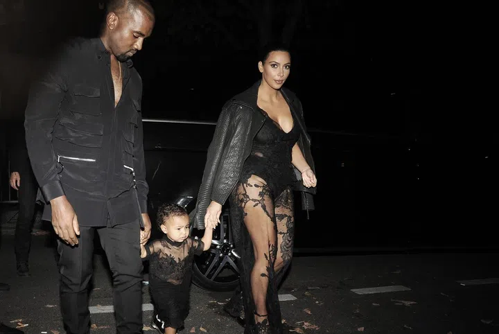 Kim Kardashian, Kanye West and North West out for dinner in Paris. <P> Pictured: Kim Kardashian, Kanye West and North West <P><B>Ref: SPL853312  280914  </B><BR /> Picture by: UKNY / Splash News<BR /> </P> <P><B>Splash News and Pictures</B><BR /> Los Angeles: 310-821-2666<BR /> New York: 212-619-2666<BR /> London: 870-934-2666<BR /> photodesk@splashnews.com<BR /> </P>