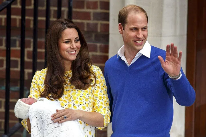 Posing outside St. Mary's Hospital in London after the birth of Princess Charlotte. Photo: Getty 