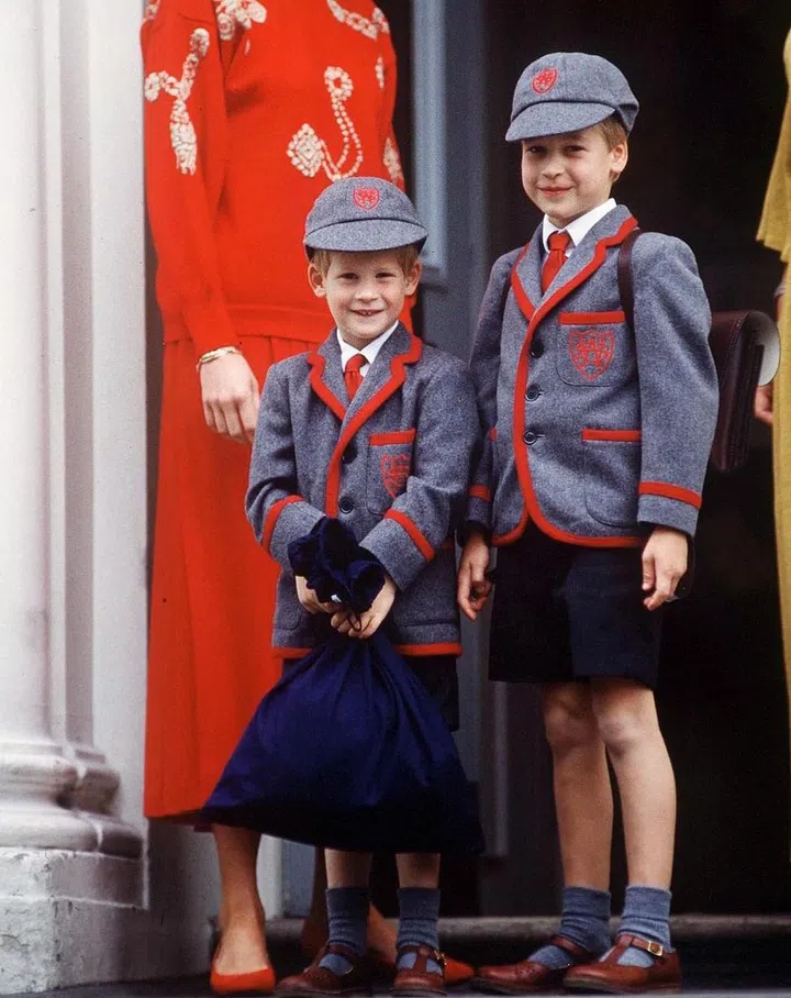 Prince Harry, 5, and his brother Prince William, 7, on Harry's first day of school at Wetherby School in London.