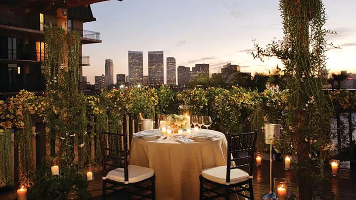 Get your Julia Roberts on with the $100,000 "Pretty Woman for a Day" experience. Including a one-night stay in the Presidential Suite, the package features three hours shopping on Rodeo Drive, including a clothing allowance of $2000 per person, a ride in a Rolls-Royce to a park for a romantic "shoeless" picnic complete with a musical serenade and a private photographer, a 90-minute couple's massage, a Diamond Manicure & Pedicure and the appearance of Wolfgang Puck himself during a private dinner on the Veranda Suite.