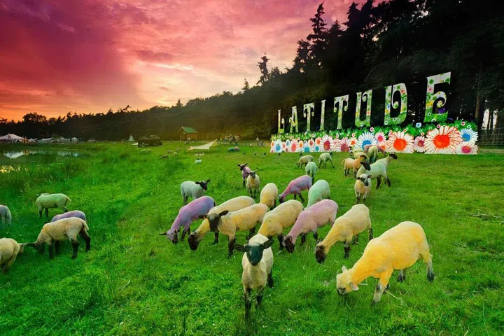 WHEN: July 14-17, 2016
WHERE: Southwald, UK
WHY: The sweet, shy, wholesome sibling to England's Glastonbury festival, Latitude's lakeside scene near the quiet town of Southwald has been a hit since it began ten years ago. The event caters to newly-thirty-somethings, families, and young-at-heart middle-classers who are willing to make the journey to the remote grounds to get their fix of boho, indie tunes and cotton candy-colored sheep.
WHO'S PLAYING: The National, New Order, Maccabees, M83, The Lumineers, CHVRCHES, Beirut, Grimes, MØ, and more. 
For additional information and tickets visit latitudefestival.com.
Photo: Latitude
