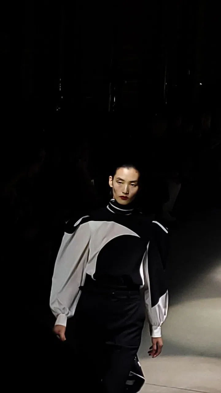 Graphic collaged fabrics referencing silver screen heroins of French cinema at Givenchy AW2020.
