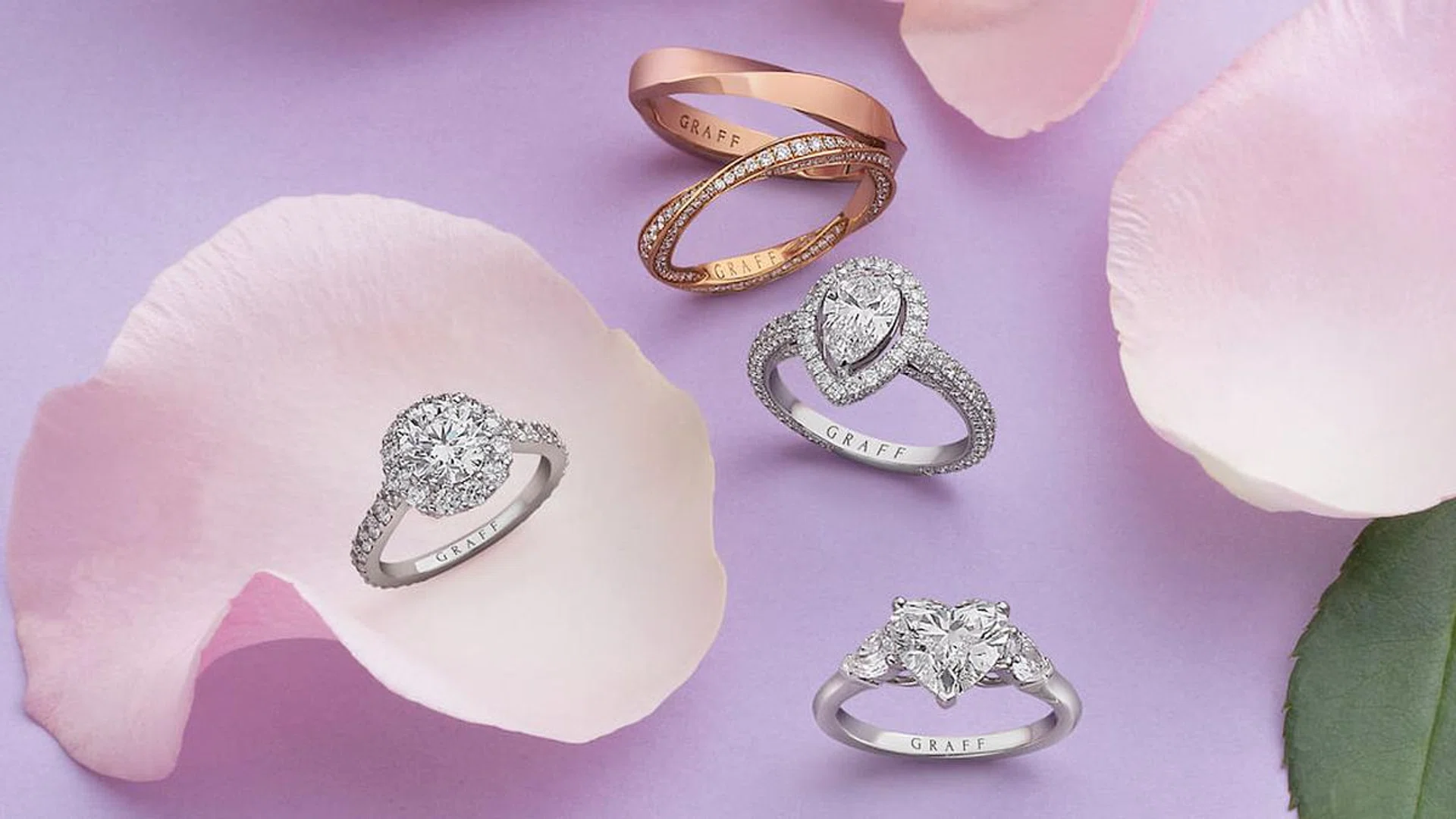 GRAFF SPIRAL COLLECTION: Rose gold ring; rose gold and pavé diamond ring, from $3,000. White gold and 1.01-carat pear-shaped diamond Constellation ring; white gold and 1.11-carat round diamond Icon ring; white gold and 2.01-carat heart-shaped diamond Promise ring. (Photo: Ching)