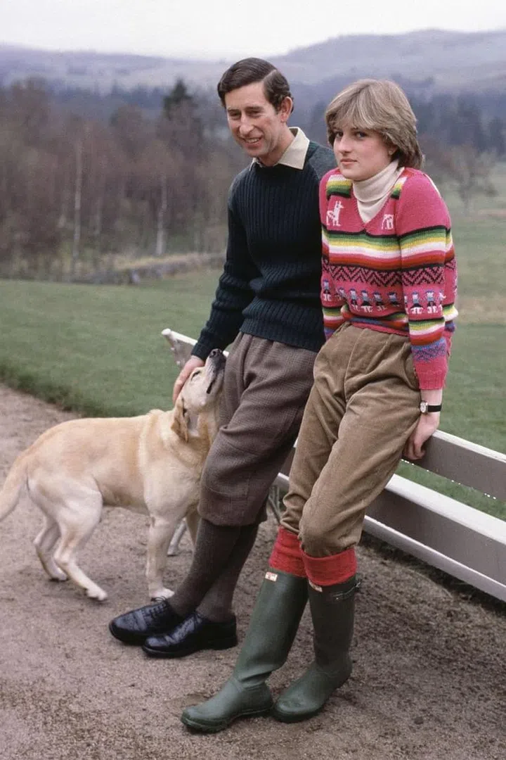 With their dog Harvey in Scotland. Photo: Getty 